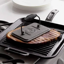 Prensa de parrilla de hierro rectangular Lodge